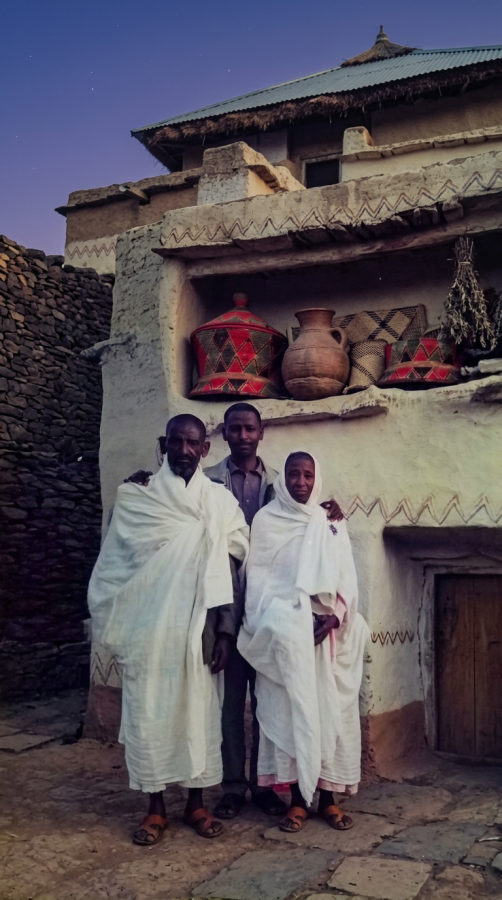 Professor Meareg Amare with his parents at the family home in his home village, early 2000s.