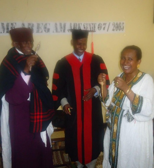 Professor Meareg Amare and his wife at his PhD graduation ceremony in Bahir Dar, with their godfather.