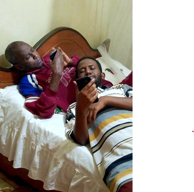 Professor Meareg Amare with one of his sons at their home in Bahir Dar, 2019.