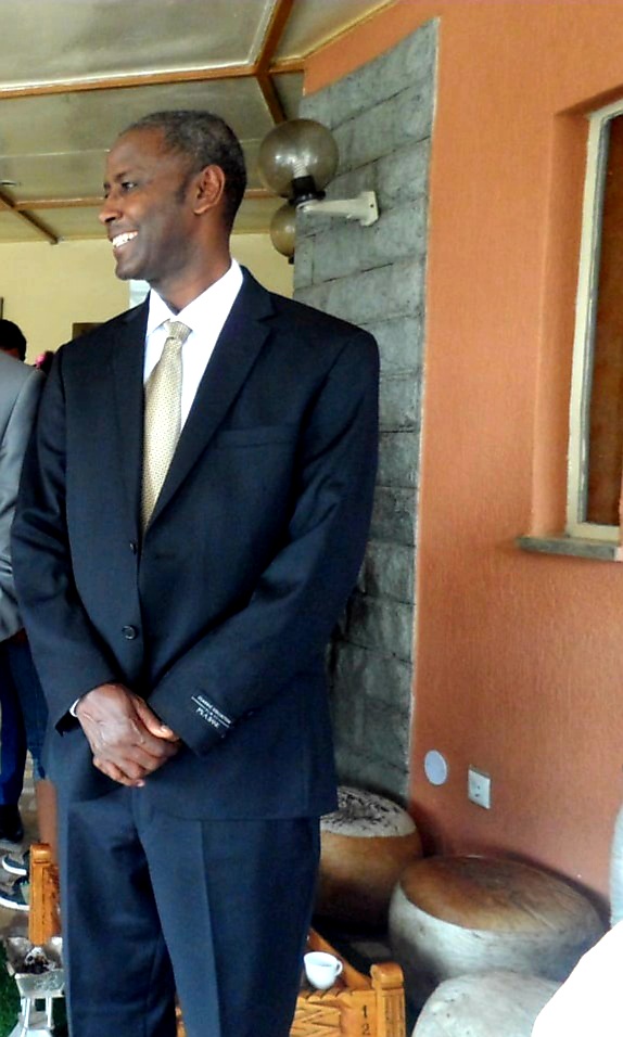 Professor Meareg Amare watching his son and daughter-in-law walk toward their wedding ceremony.