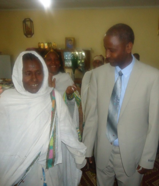 Professor Meareg Amare dancing Tigrigna with one of his sisters during a family visit.