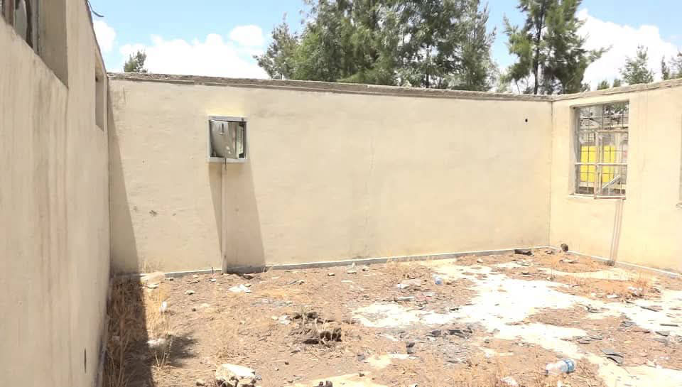 A damaged, looted school classroom in Tigray, stripped of its supplies and equipment